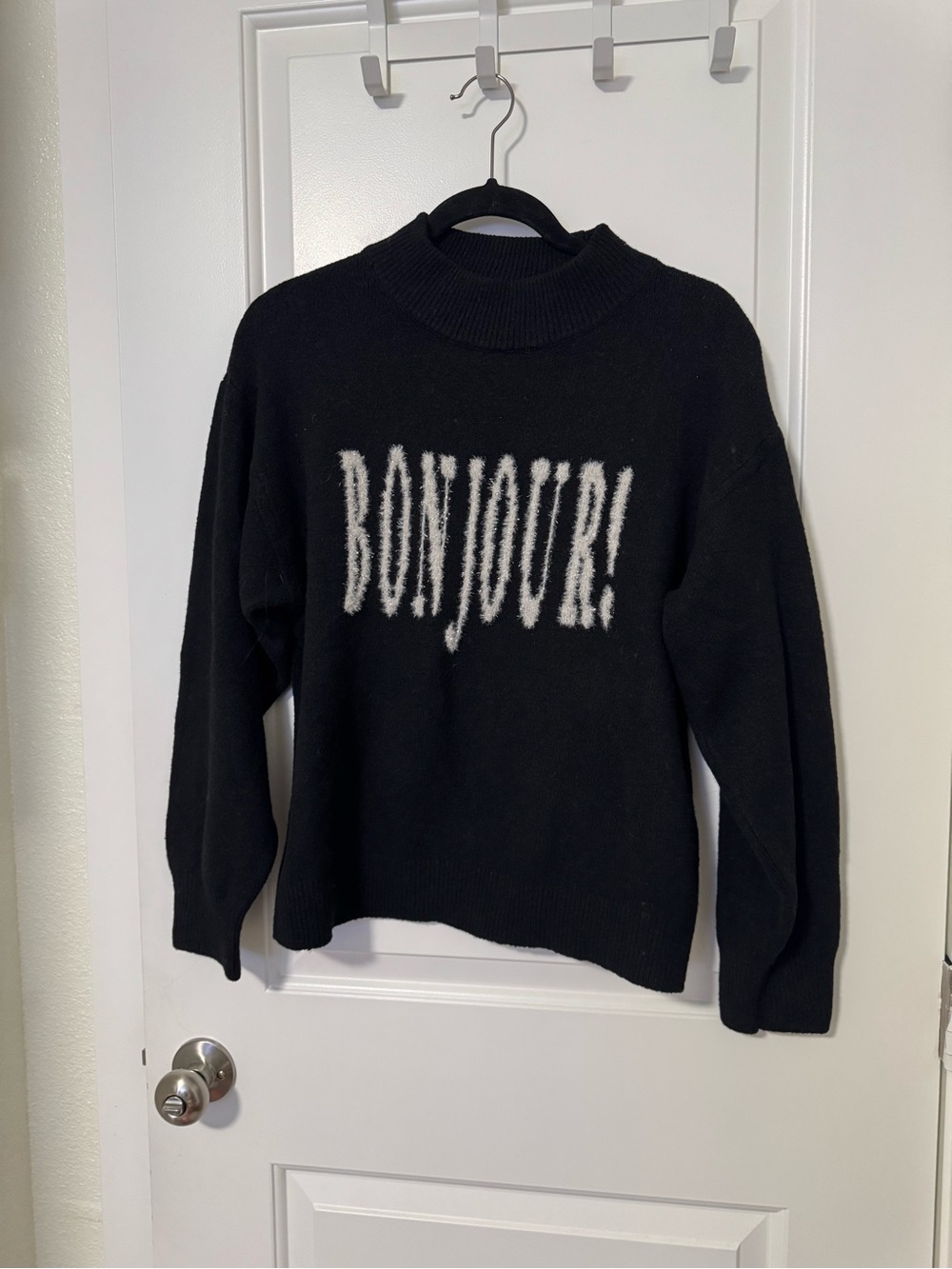 a new day Black Knit Turtleneck Sweater with White 'BONJOUR' Graphic